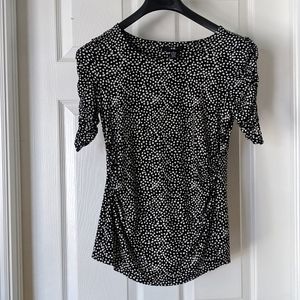 Express top ruched on both sides.